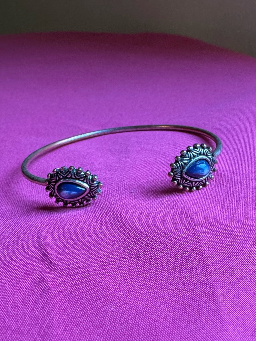 Silver Open Bangle Bracelet with Blue Stone Accents